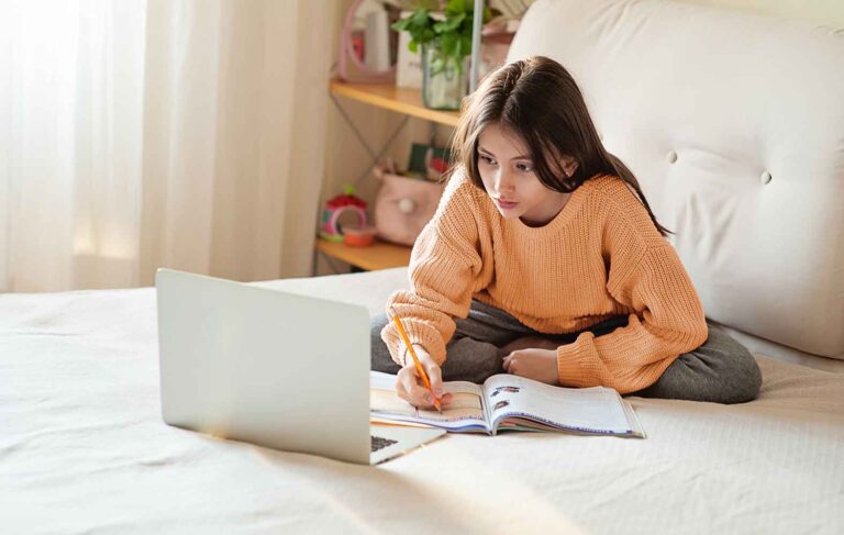 Student working in bedroom