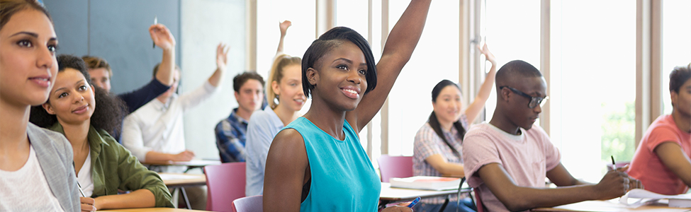 student raising hand in class