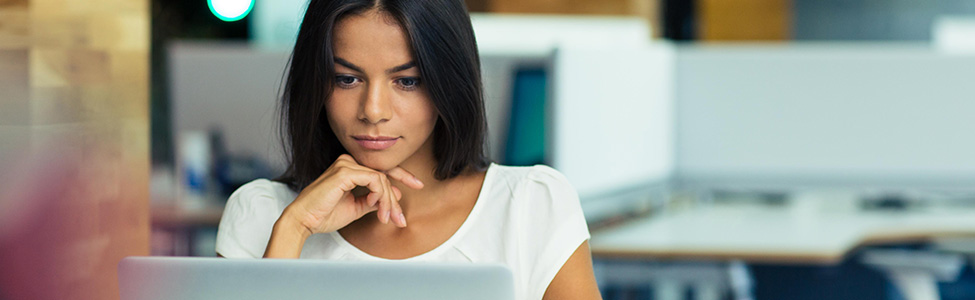 woman looking at computer